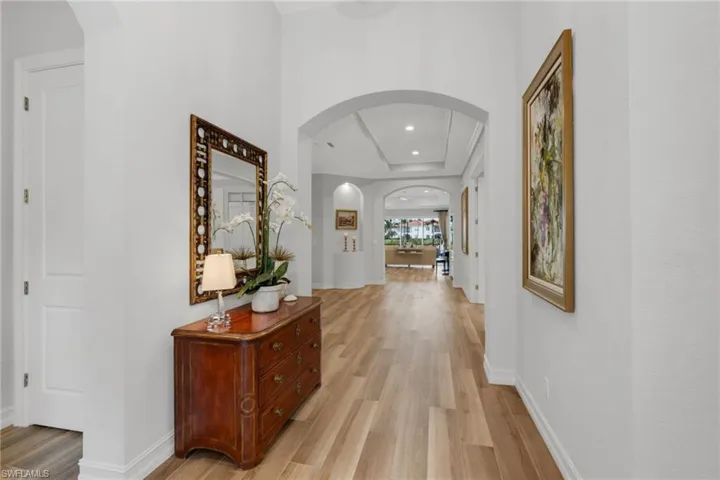Upon entering this home, there is one guest room to the left, and another to the right, with the primary bedroom on the opposite side of the home.