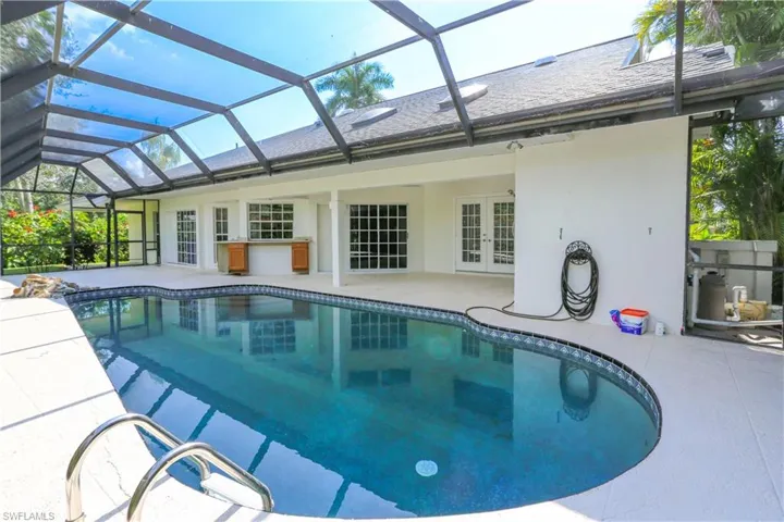 1040  Moon Lake  DR, Naples, FL 34104