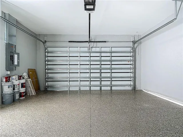 Garage featuring electric panel