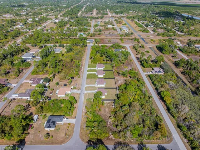 View of property location featuring nearby suburban area