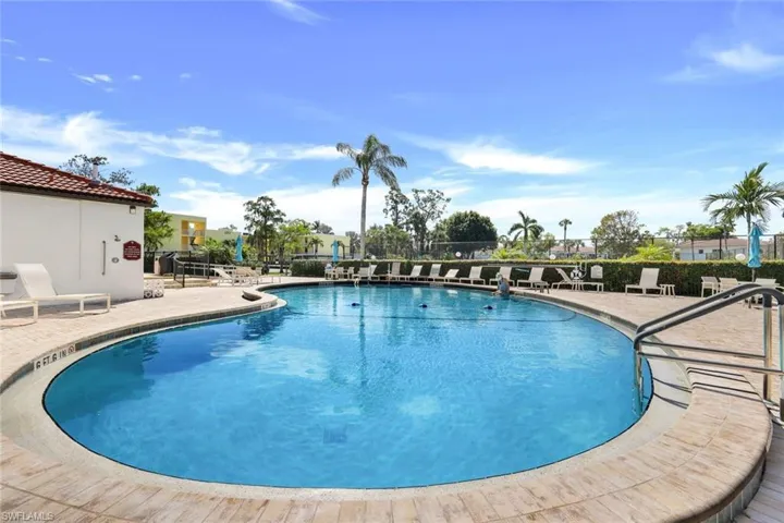 Community pool featuring a patio area