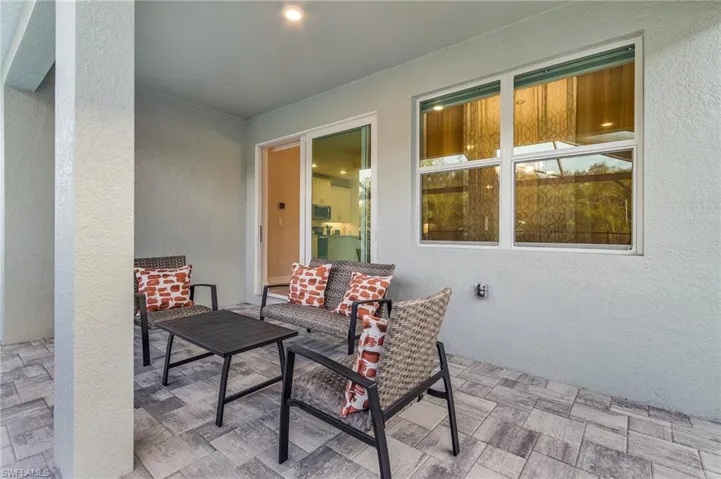 View of patio featuring an outdoor hangout area