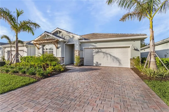 View of front of home featuring a garage