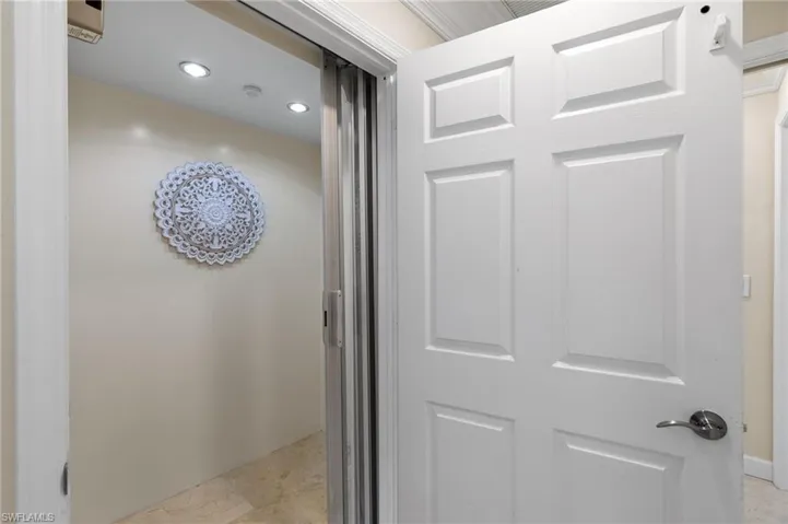 Corridor with recessed lighting