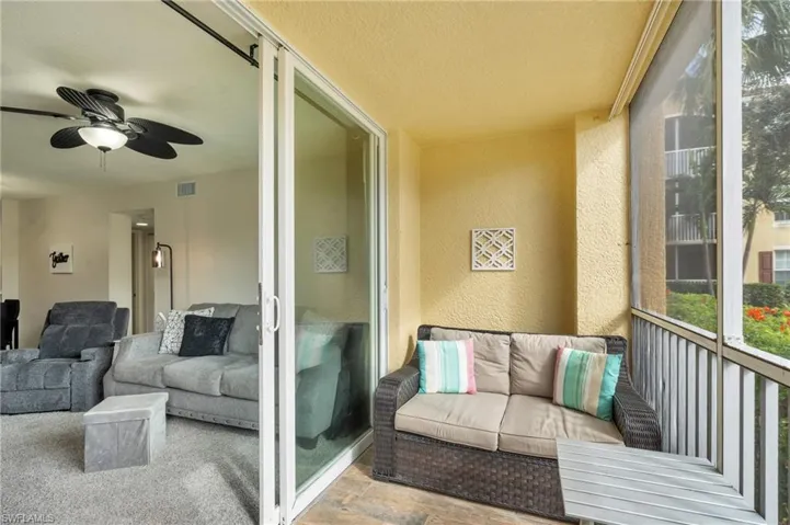 Balcony featuring ceiling fan