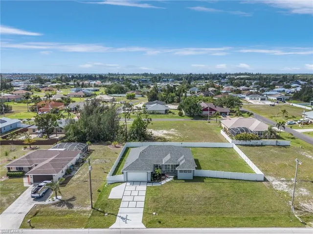 Birds eye view of property with a residential view