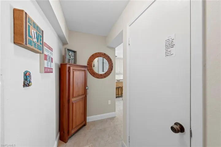 Hall featuring baseboards