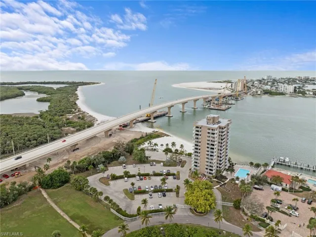 Aerial view of a notable bridge and a large body of water