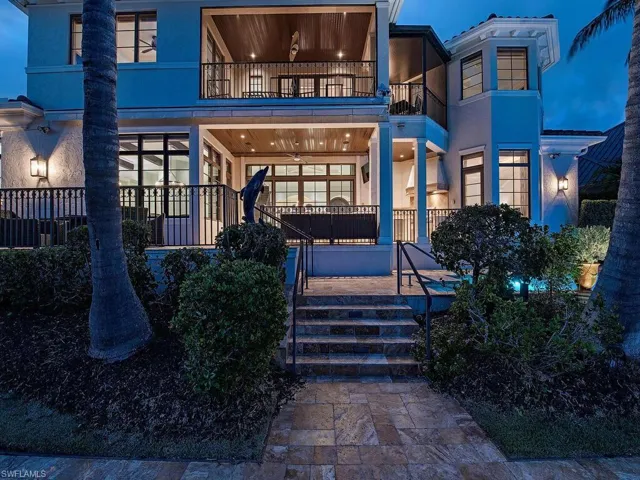 View of front of property featuring a balcony