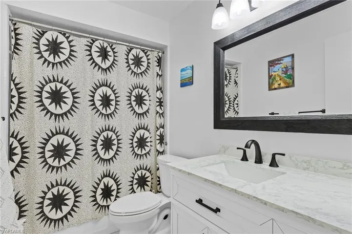 Bathroom with vanity and toilet