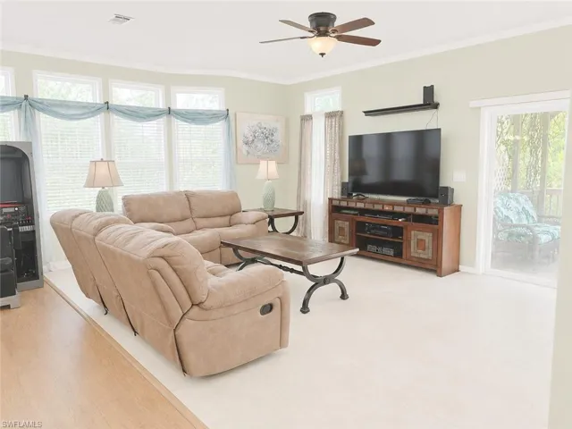 Living area with light-colored carpeting