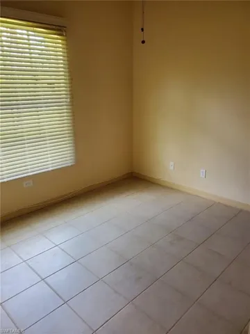 View of tiled spare room
