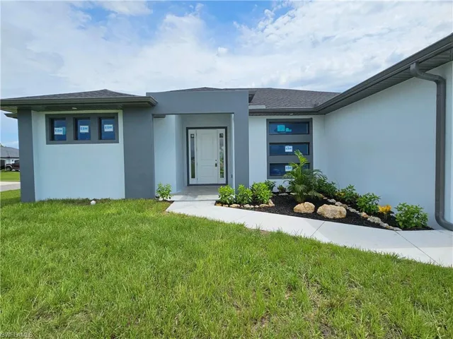 View of front of home with a front lawn