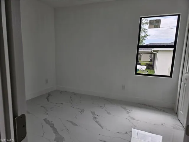 View of tiled spare room