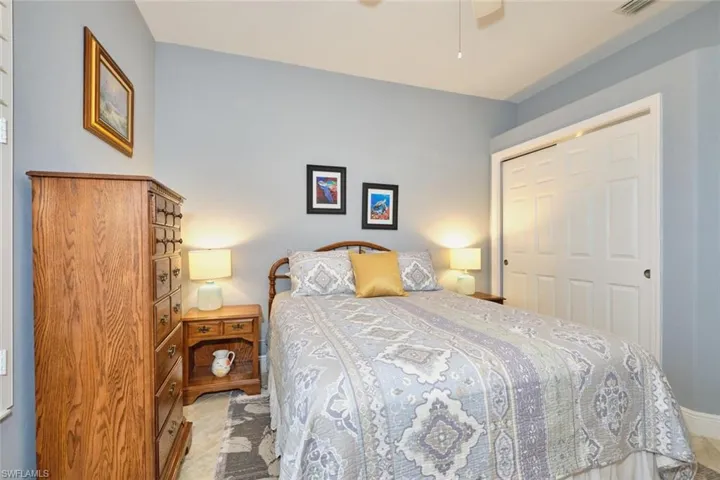 Bedroom with a closet and ceiling fan