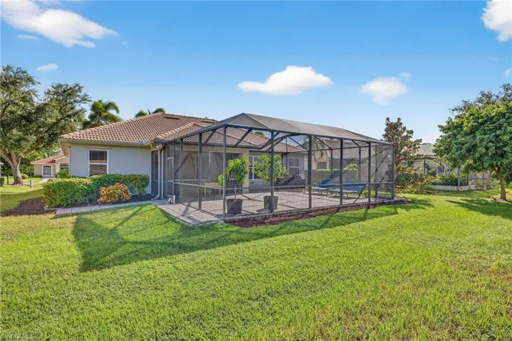 Rear view of house with lanai.