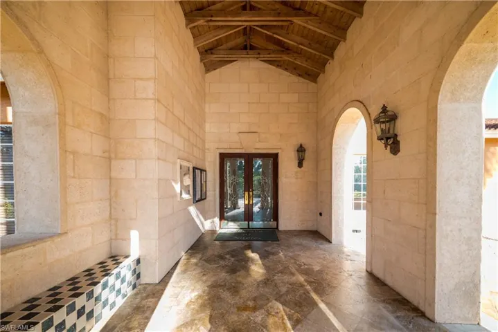 Doorway to property featuring french doors