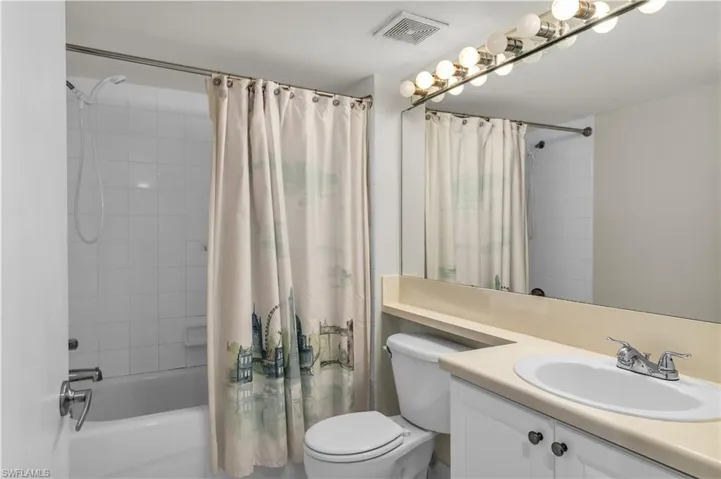 Full bathroom featuring vanity and shower / bath combo