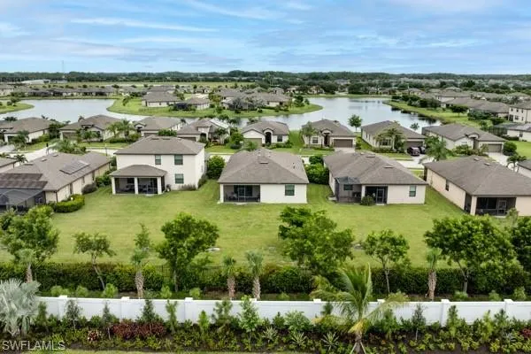 Aerial view of residential area with a large body of water