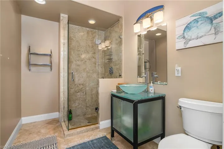 Pool Bathroom (4th full bathroom) featuring a stall shower, vanity, and recessed lighting