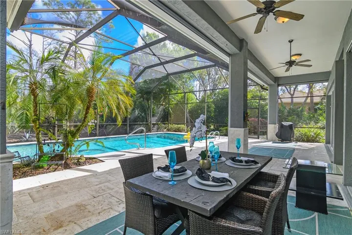 Lanai featuring electric storm shutters and large under cover outdoor area