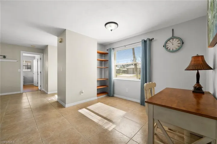 Office space with light tile patterned floors