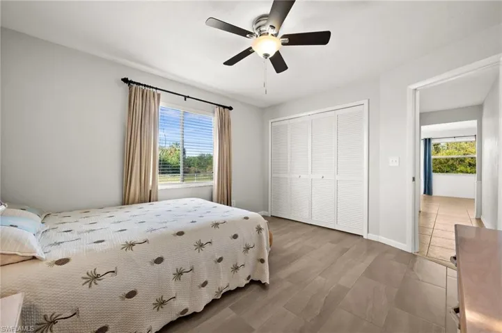 Bedroom with a closet and ceiling fan