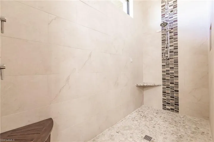 Bathroom with tiled shower