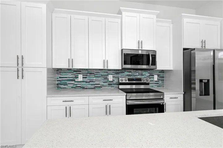 921  Bolivia  DR, Lehigh Acres, FL 33974