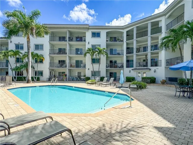 View of swimming pool with a patio