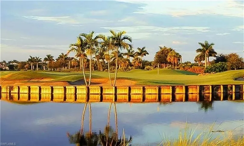 Water view with a golf course