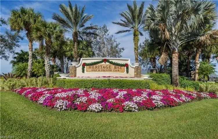 Community sign featuring a yard