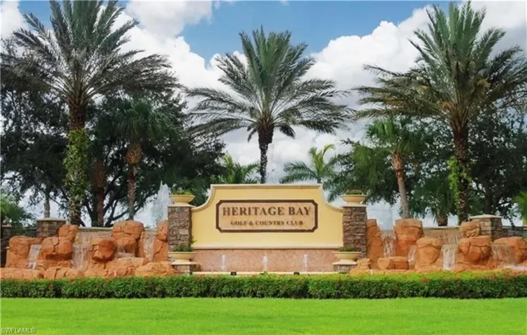 Community / neighborhood sign with a lawn