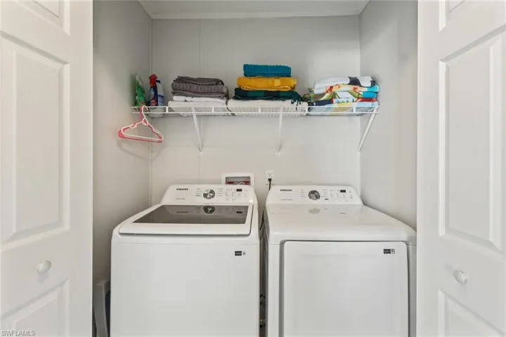 Laundry area featuring washing machine and dryer