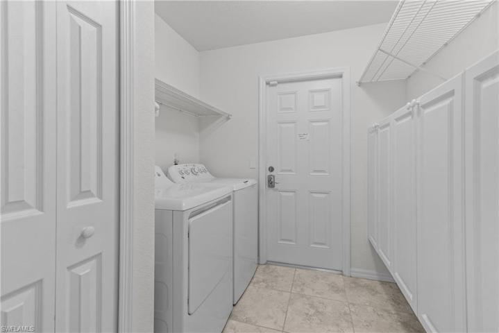 Exit to garage from laundry room.
