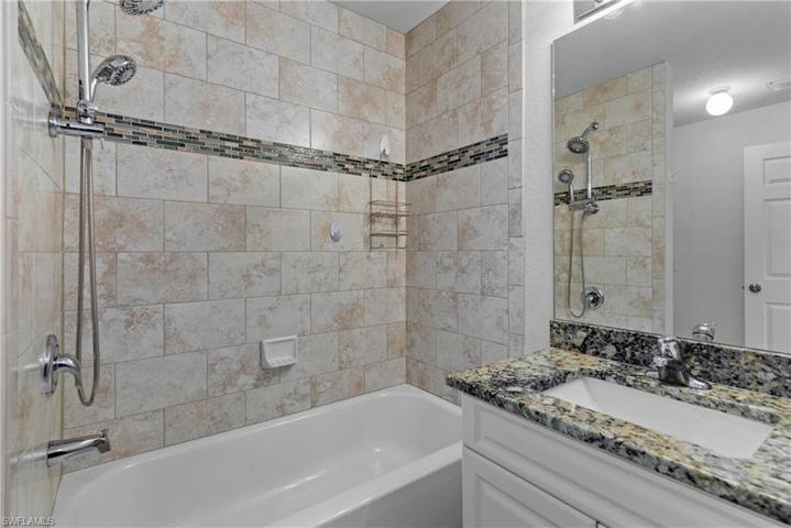 Bath exits to pool area.
