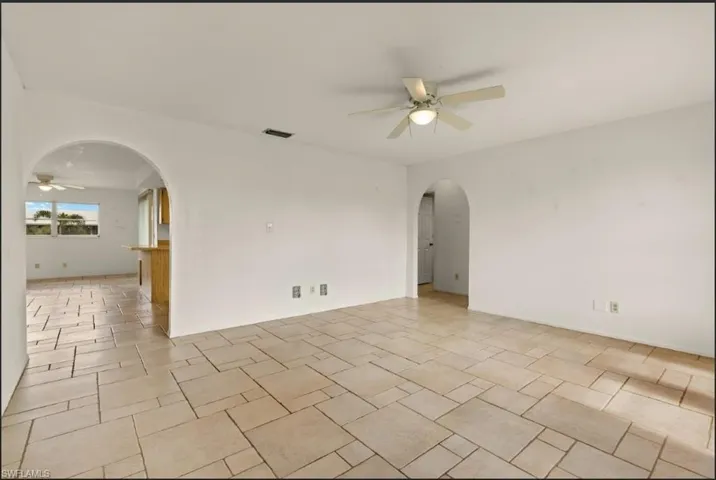 Spare room featuring ceiling fan