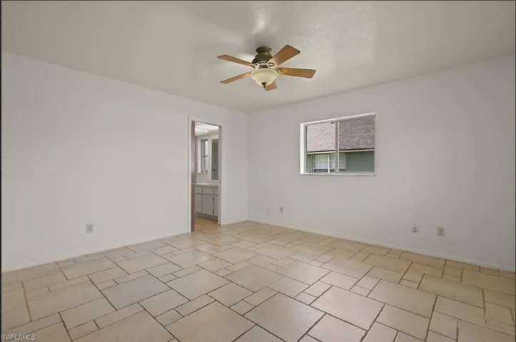Spare room featuring ceiling fan