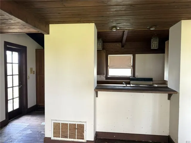 Kitchen with Door to the Left Front Balcony