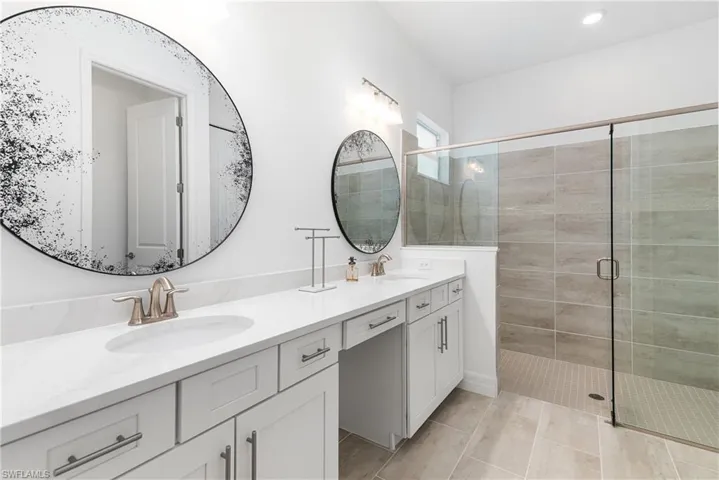 Dual Sinks with oversized Walk-in Shower