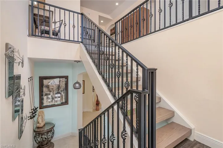 VIEW OF STAIRS FROM LANDING BETWEEN 2ND (MAIN LIVING AREA) AND 3RD FLOOR (LOFT (WITH WALL BED)