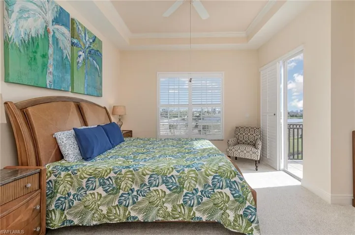 OWNER'S SUITE WITH DIRECT ACCESS TO OPEN TERRACE.  COFFERED CEILING.  PLANTATION SHUTTERS.  CROWN MOLDING.