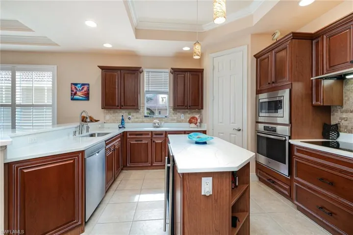 SPACIOUS KITCHEN WITH PANTRY AND LOTS OF STORAGE.  ELECTRIC COOKTOP.