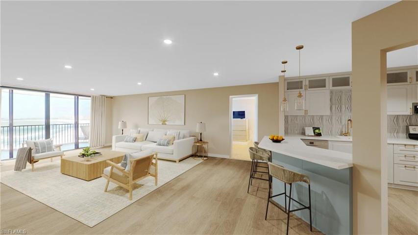 Reality staged and renovated to showcase the possibility of the living room and kitchen.