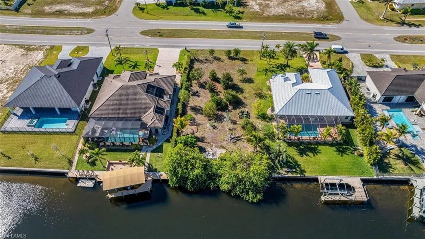 Bird's eye view with a residential view and a water view