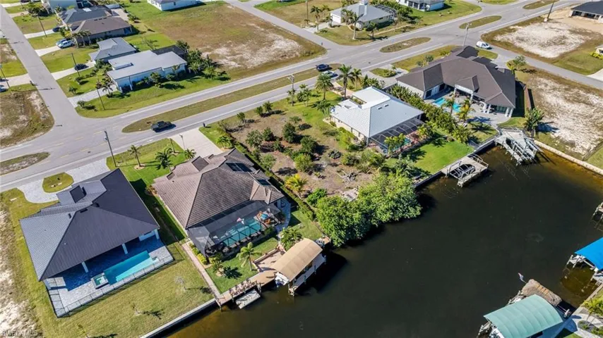 Aerial view with a residential view and a water view