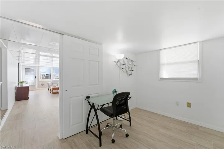 Office space featuring light wood-type flooring