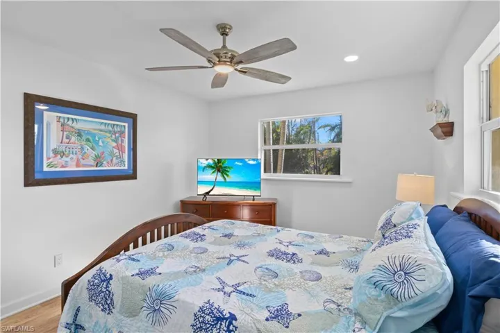 Comfortable guest bedroom with ample space and a calming atmosphere.