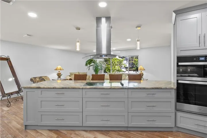 Beautifully updated kitchen with custom cabinetry, premium appliances, and a spacious layout.
