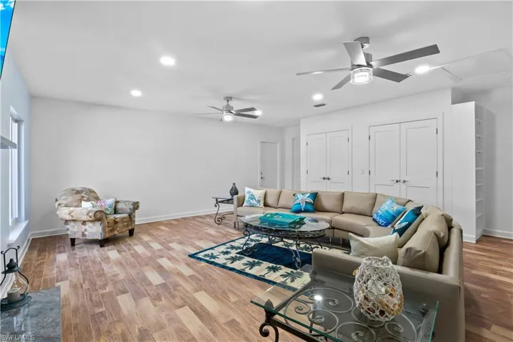 Cozy TV room offering a perfect space for movie nights or relaxation.